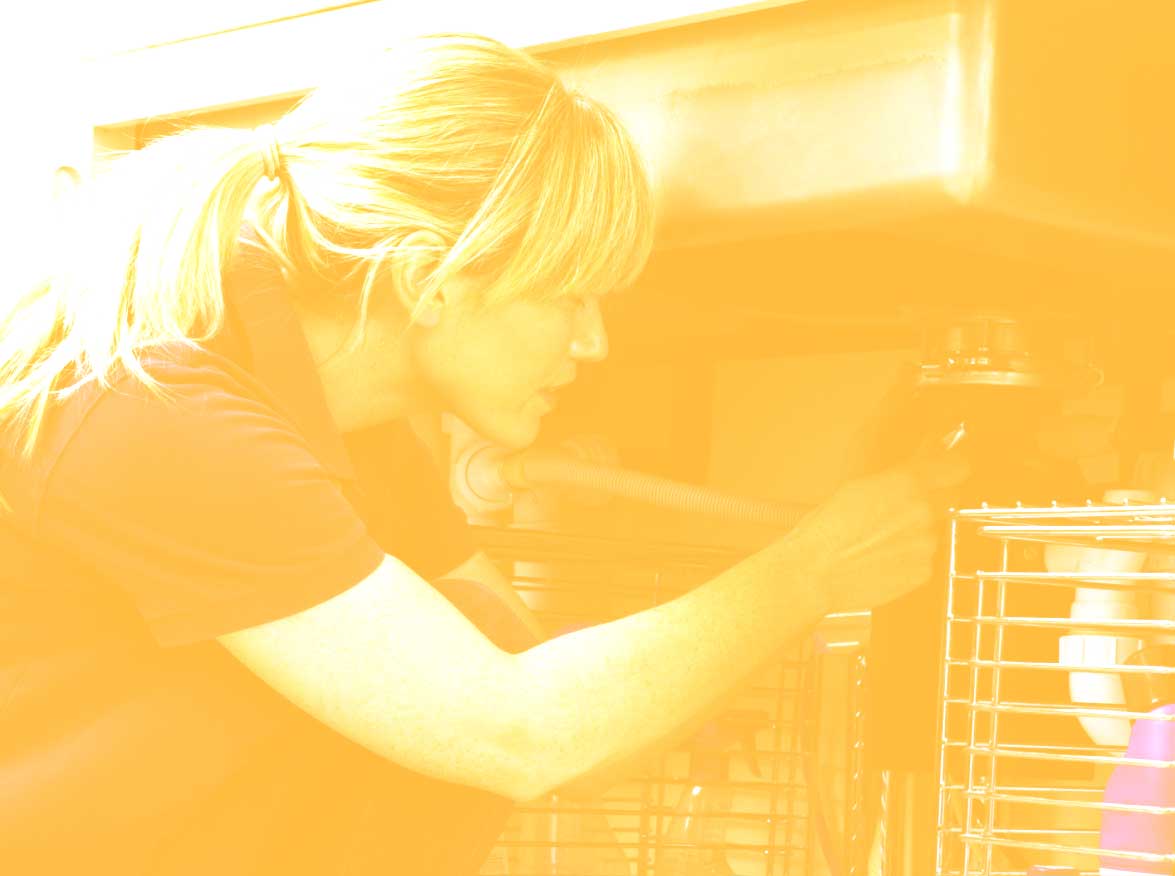 Woman repairing sink